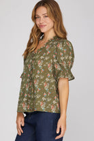 Brown floral ruffle-neck blouse detail view