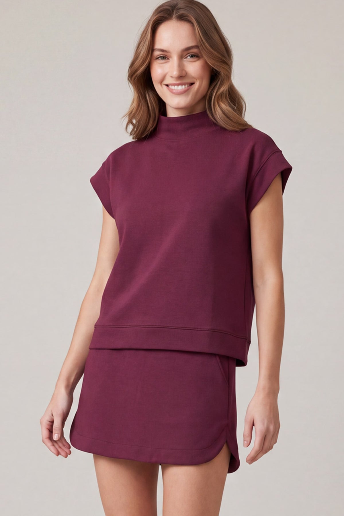 Wine mock-neck scuba knit top and mini skirt set front view