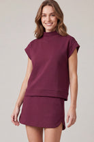 Wine mock-neck scuba knit top and mini skirt set front view