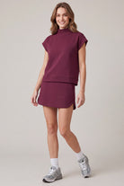 Wine mock-neck scuba knit top and mini skirt set detail view